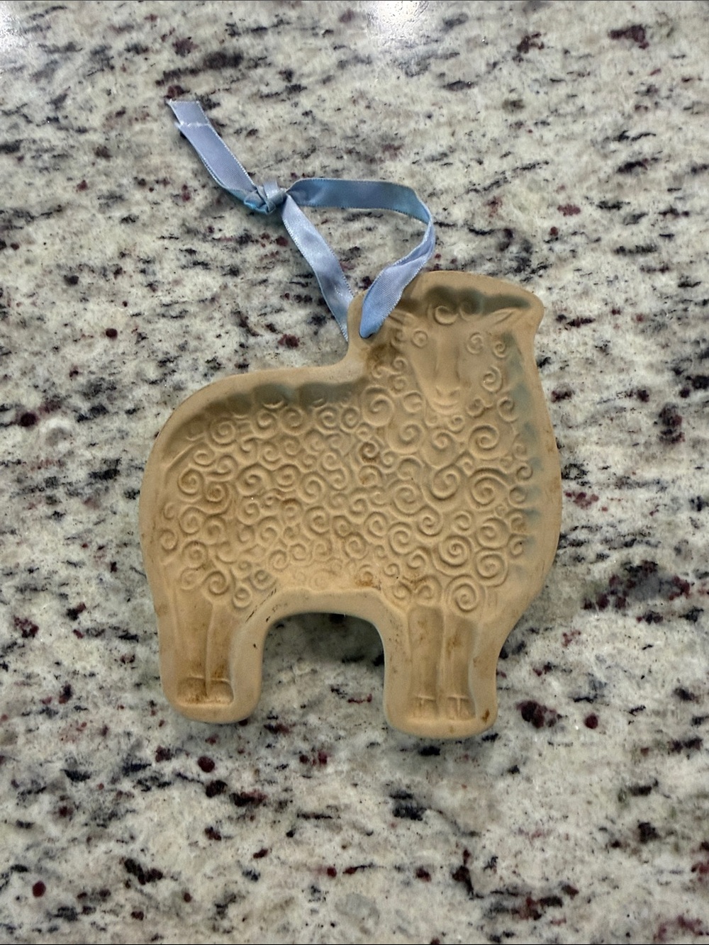 Cream Sheep Ornament with Blue Ribbon Accent